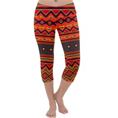 Boho Orange Tribal Pattern Capri Yoga Leggings by SpinnyChairDesigns