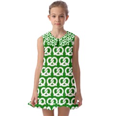 Green Pretzel Illustrations Pattern Kids  Pilgrim Collar Ruffle Hem Dress by GardenOfOphir