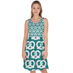 Teal Pretzel Illustrations Pattern Knee Length Skater Dress With Pockets by GardenOfOphir