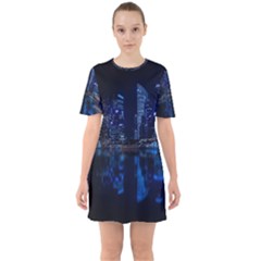 Illuminated Cityscape Against Blue Sky At Night Sixties Short Sleeve Mini Dress by Modalart